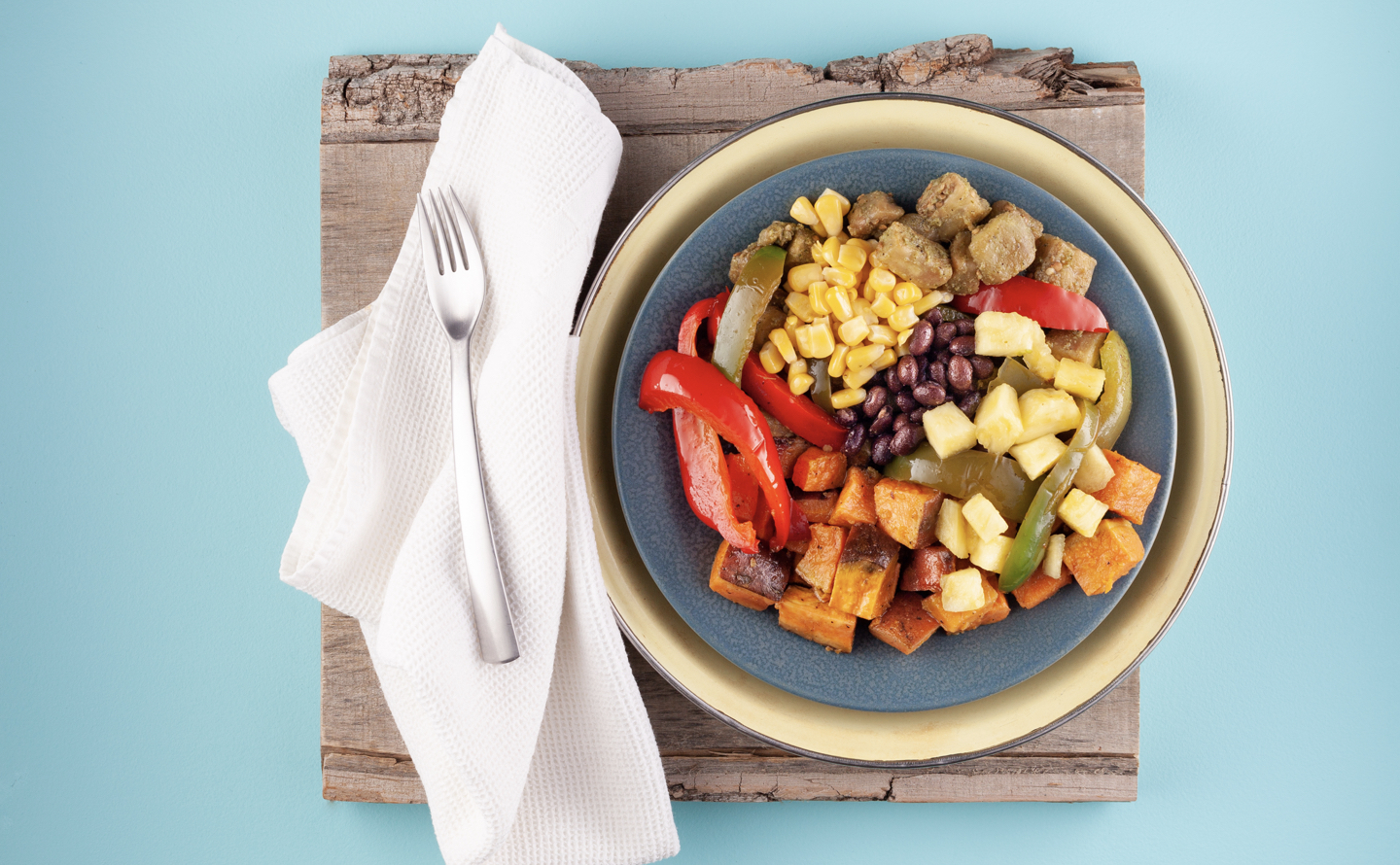 Jerk Eggplant and Black Bean Bowl with Fresh Pineapple