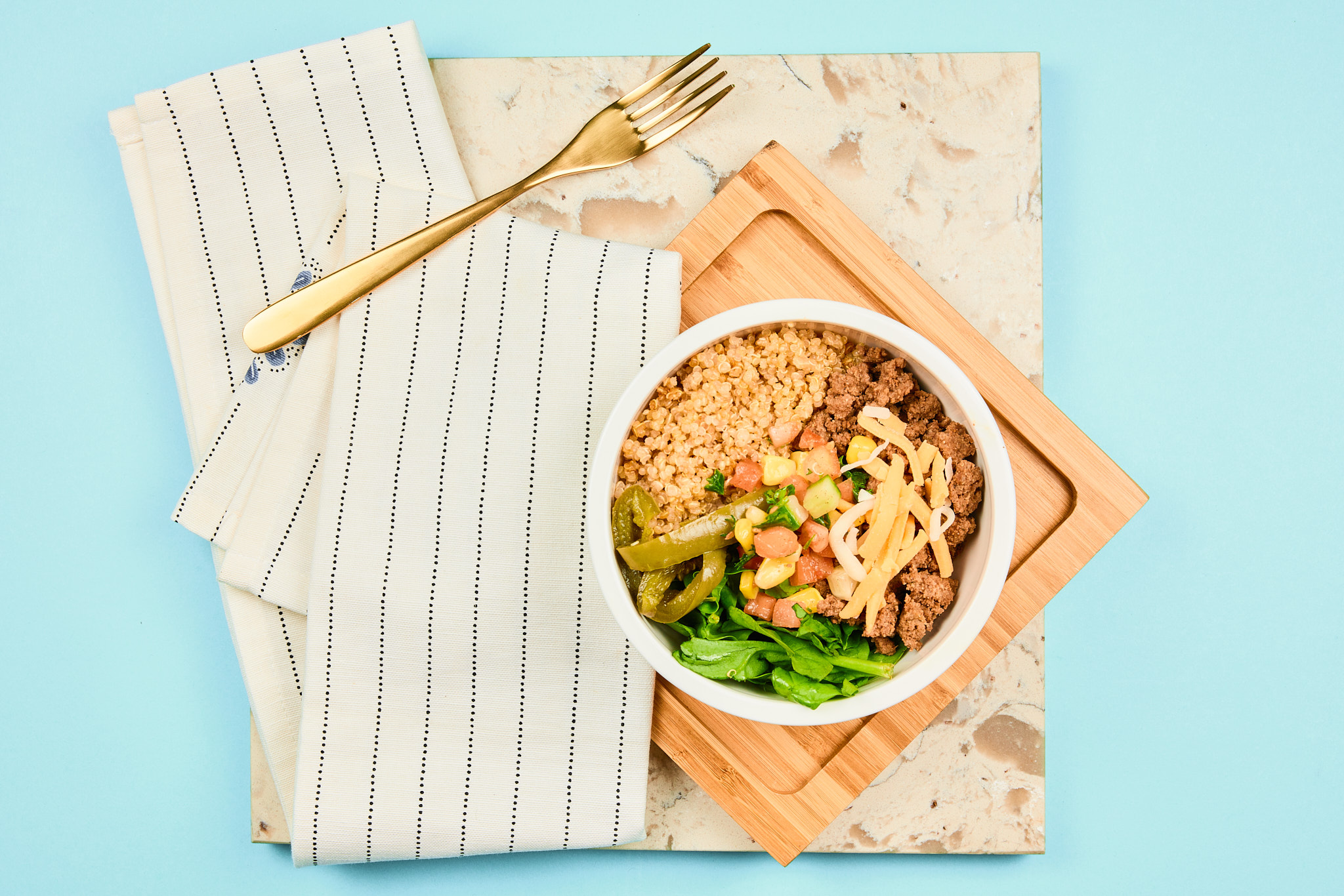 Cheesy Southwest Beyond Beef Bowl with Corn, Tomato, Cucumber Salad