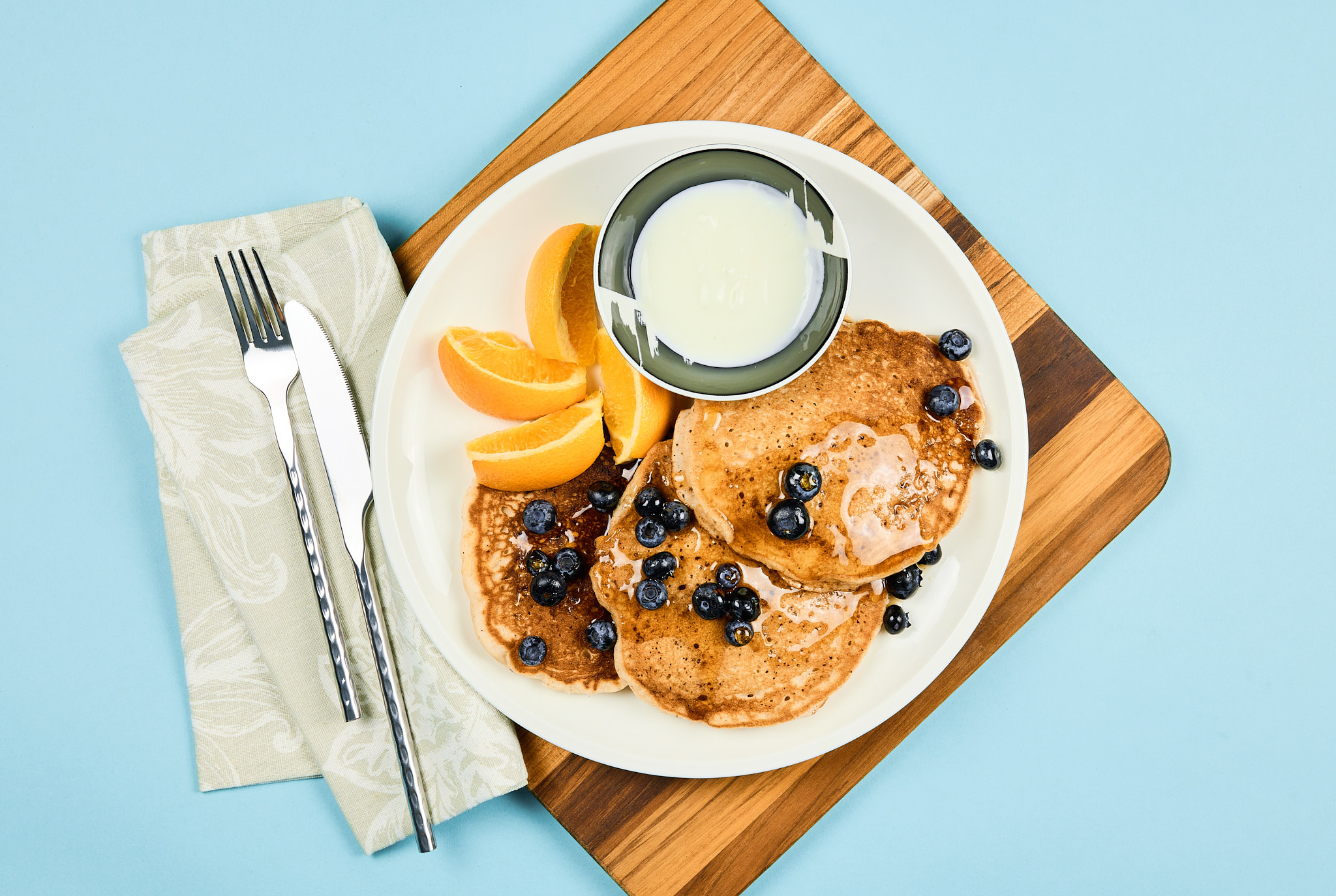 Protein Carrot Cake Pancakes with Greek Yogurt Frosting