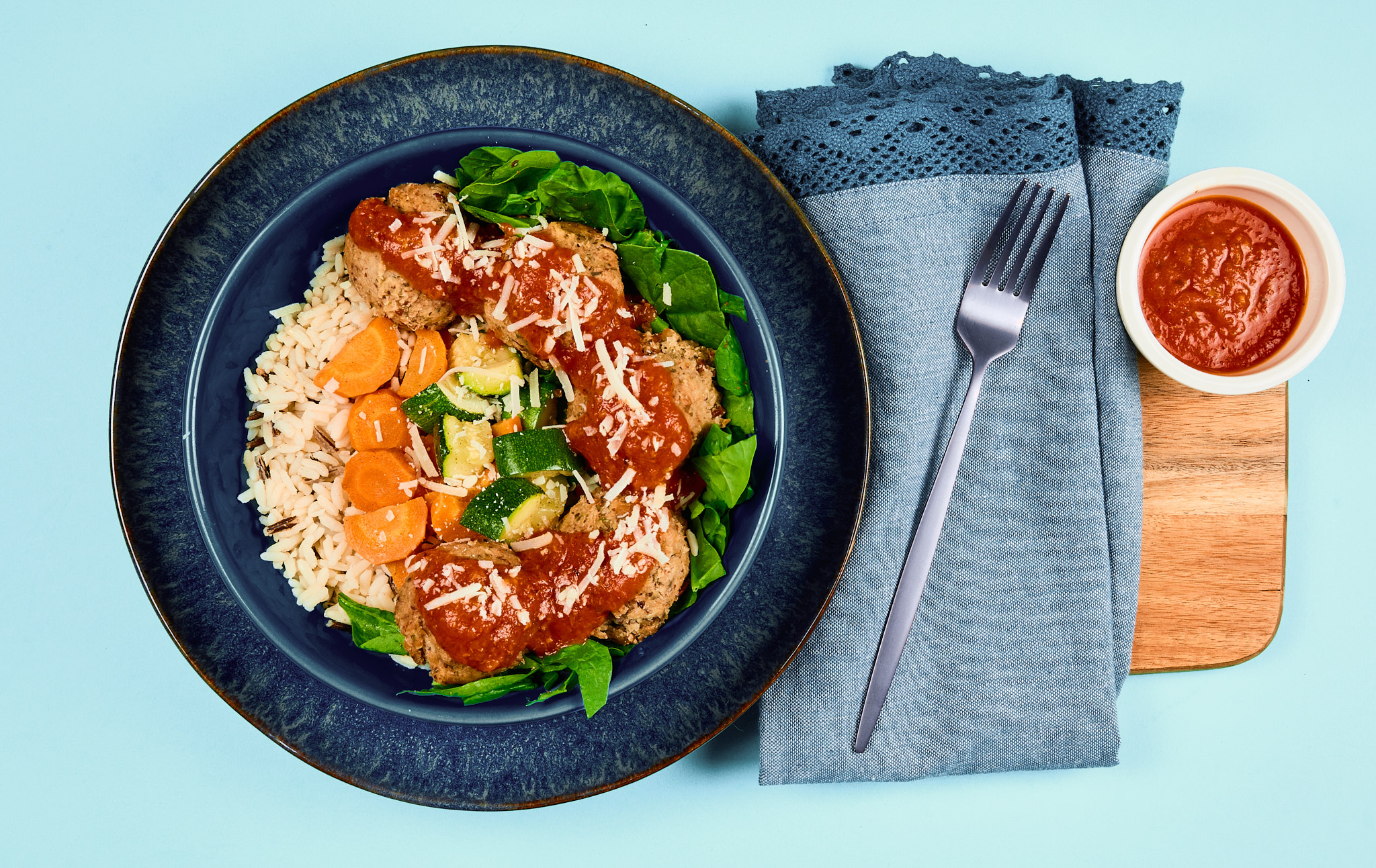 Turkey Meatballs with Puttanesca Sauce On Wild Rice