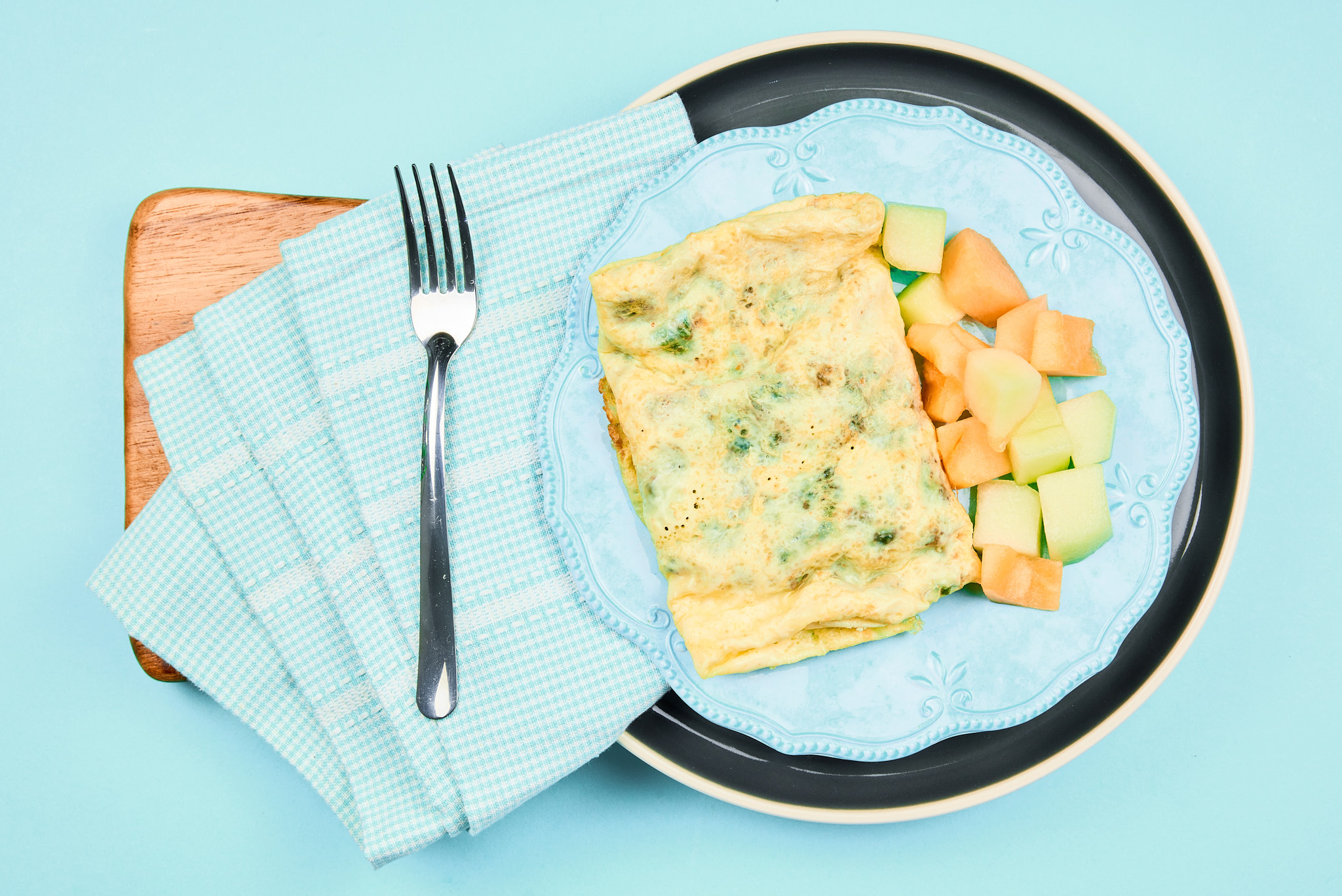 Vegetarian Spinach Tomato Swiss Omelette with Fresh Fruit