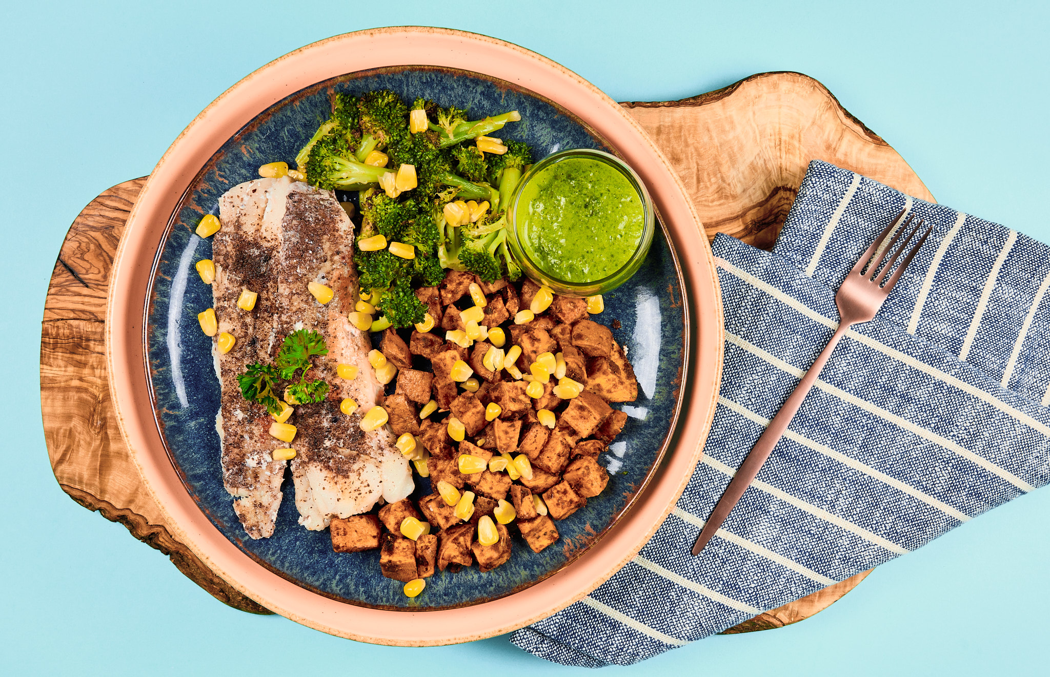 Sumac Basa with Chimichurri On Roasted Sweet Potatoes